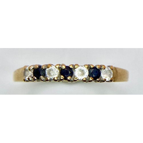 1079 - A Vintage 9K Yellow Gold, White and Blue Stone Ring. Size K. 
1g total weight.