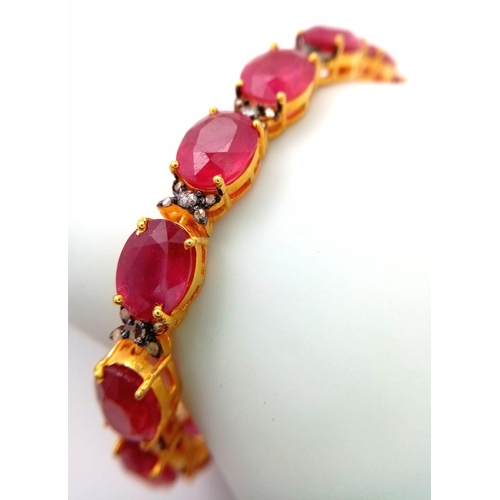 29 - An Oval Cut Ruby and Diamond Gemstone Tennis Bracelet set in Gold Plated 925 Silver. 50ctw Rubies an... 