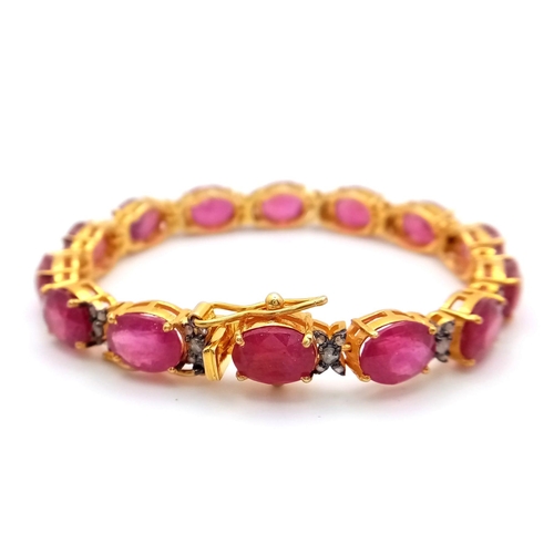 29 - An Oval Cut Ruby and Diamond Gemstone Tennis Bracelet set in Gold Plated 925 Silver. 50ctw Rubies an... 