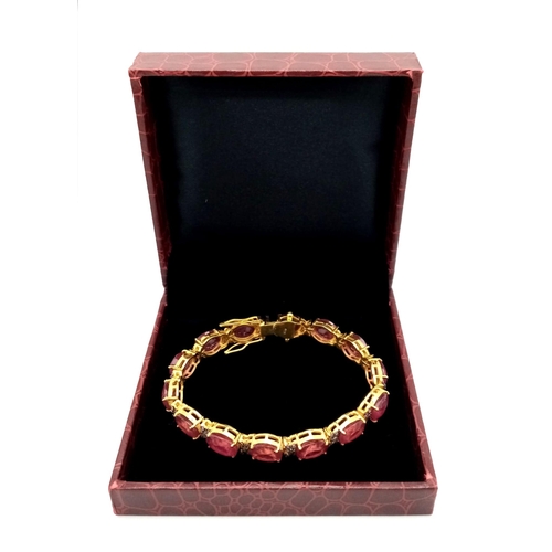 29 - An Oval Cut Ruby and Diamond Gemstone Tennis Bracelet set in Gold Plated 925 Silver. 50ctw Rubies an... 