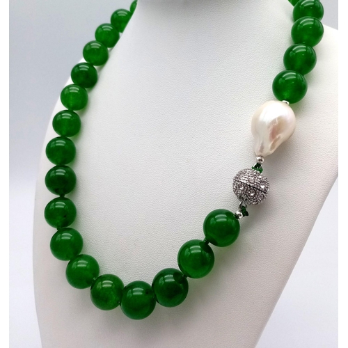 341 - A Gorgeous Green Jade Bead Necklace with a Large Keshi Baroque Pearl Interrupter. Beads - 14mm. Pear... 