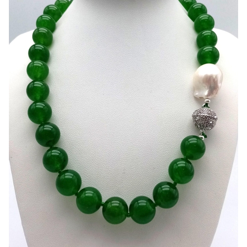 341 - A Gorgeous Green Jade Bead Necklace with a Large Keshi Baroque Pearl Interrupter. Beads - 14mm. Pear... 