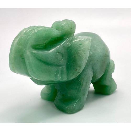 1085 - A Hand-Carved Green Jade Elephant Figure. 5.5 x 4cm