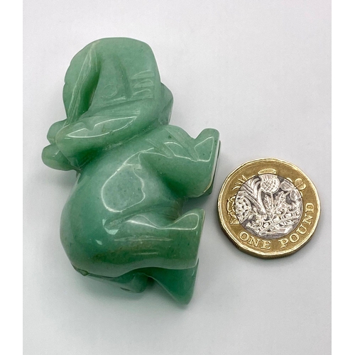 1085 - A Hand-Carved Green Jade Elephant Figure. 5.5 x 4cm