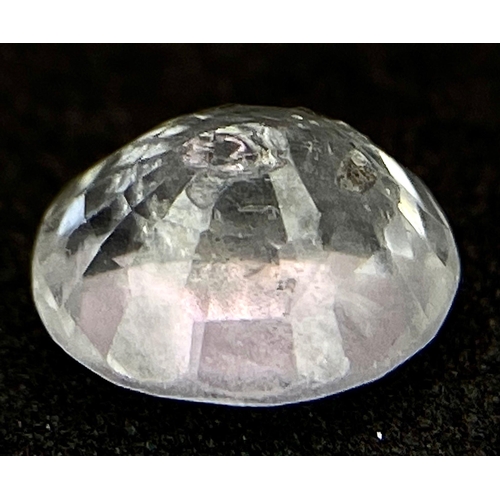 1390 - A 0.78ct Madagascar Natural White Sapphire, in the Oval Faceted cut. Comes with the AIG Certificate.