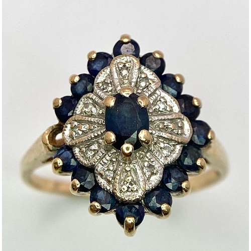 663 - A 9K Yellow Gold Diamond & Sapphire Cluster Ring. One stone missing. Size O, 3.2g total weight.    R... 