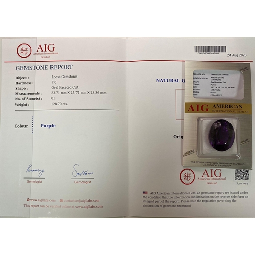 981 - A 128.70ct Brazilian Deep Purple Amethyst, in the Oval Faceted cut. Comes with the AIG certificate. ... 