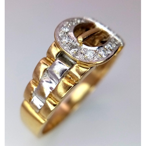 276 - A 9K 2 Colour, Diamond Set Buckle Ring. Size Y, 6.9g total weight.    Ref: 7427