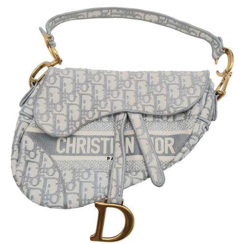 8 - A Christian Dior Grey Saddle Bag, Gold tone hardware and Dior letter charm, comes with the additiona... 