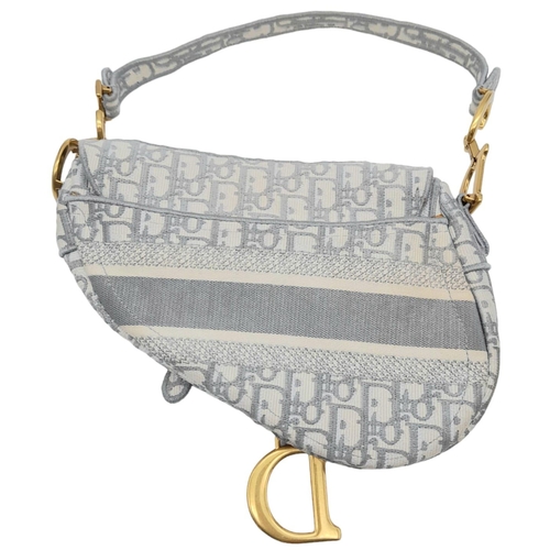 8 - A Christian Dior Grey Saddle Bag, Gold tone hardware and Dior letter charm, comes with the additiona... 