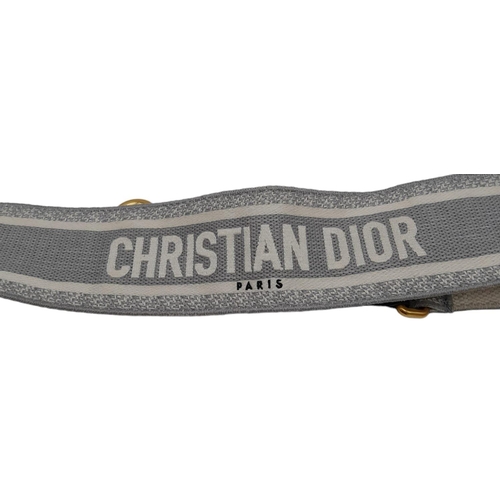 8 - A Christian Dior Grey Saddle Bag, Gold tone hardware and Dior letter charm, comes with the additiona... 