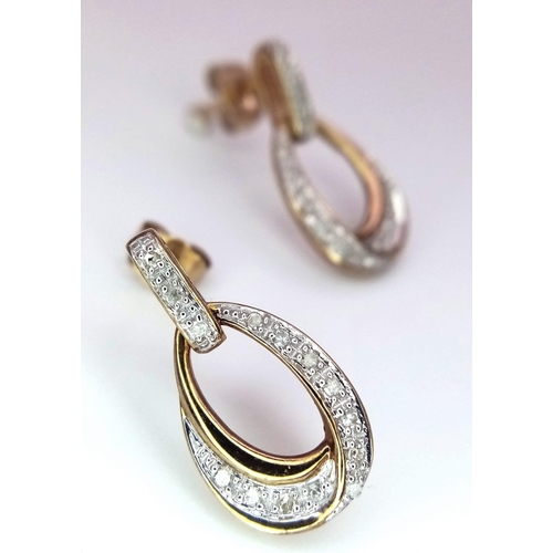 289 - A Pair of 9K Yellow Gold Diamond Set Drop Earrings. 1.8cm length, 1.7g total weight.    Ref: SC1131