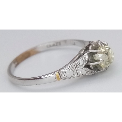 319 - An 18K White Gold and Yellow Diamond Solitaire Ring. Size M. 1.88g total weight. Ref: 15704