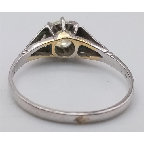 319 - An 18K White Gold and Yellow Diamond Solitaire Ring. Size M. 1.88g total weight. Ref: 15704