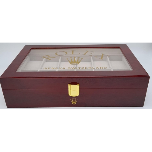 332 - A high-quality ROLEX wooden watch case for 12 watches, made from high gloss cherry veneer and polish... 