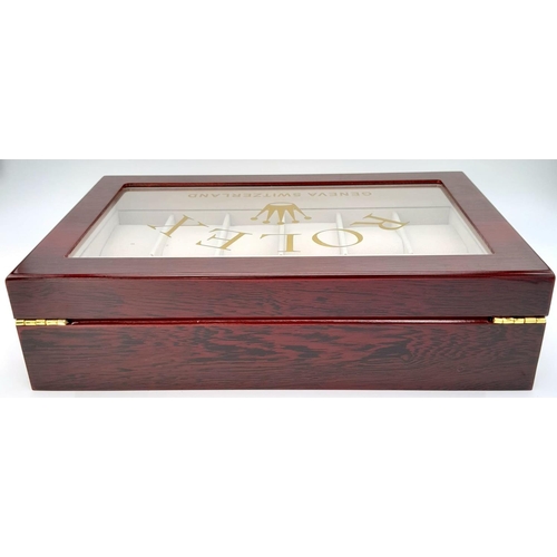 332 - A high-quality ROLEX wooden watch case for 12 watches, made from high gloss cherry veneer and polish... 