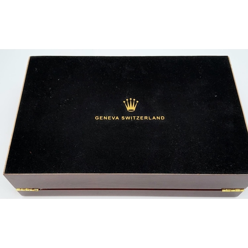 332 - A high-quality ROLEX wooden watch case for 12 watches, made from high gloss cherry veneer and polish... 