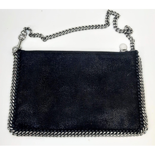 164 - A Stella McCartney Falabella Black Suede Handbag. Silver tone hardware. Burgundy textile interior. 2... 