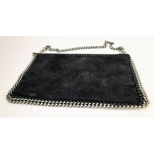 164 - A Stella McCartney Falabella Black Suede Handbag. Silver tone hardware. Burgundy textile interior. 2... 