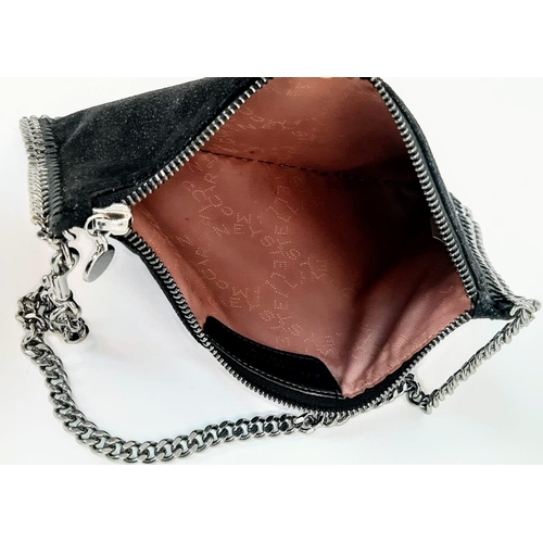 164 - A Stella McCartney Falabella Black Suede Handbag. Silver tone hardware. Burgundy textile interior. 2... 