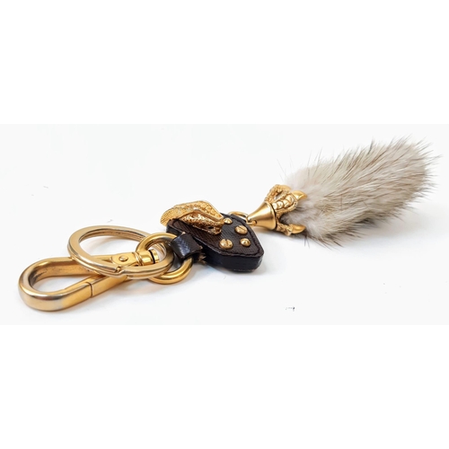 188 - A Prada Furry Key Ring! Gilded hardware with a tough leather body and furry finish. Comes with a dus... 