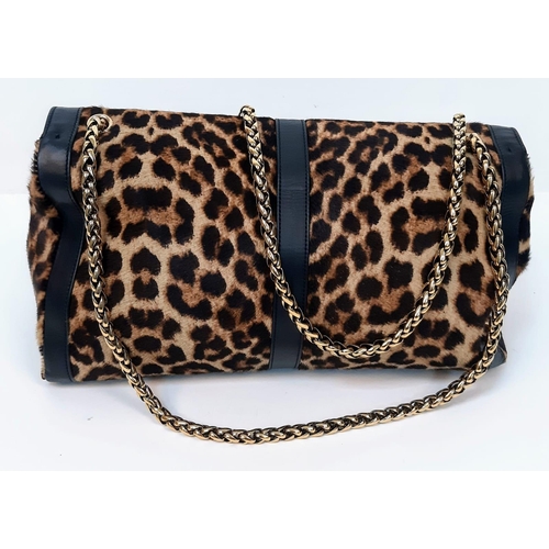 197 - A Christian Louboutin Sweet Charity Leather and Leopard Print Pony Hair Shoulder Bag. Gold tone hard... 