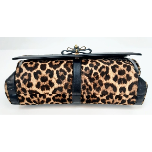 197 - A Christian Louboutin Sweet Charity Leather and Leopard Print Pony Hair Shoulder Bag. Gold tone hard... 