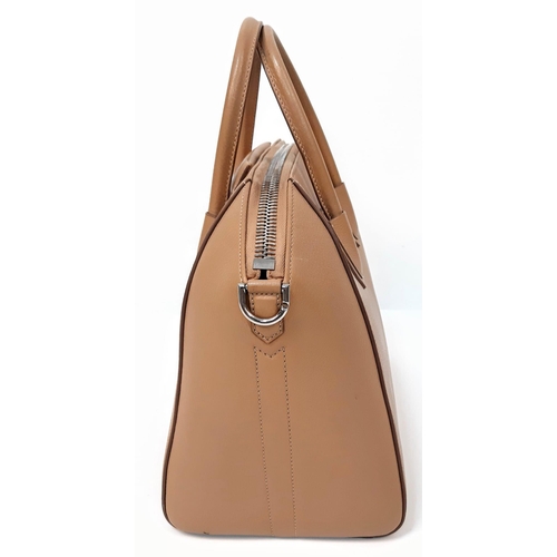 205 - A Givenchy Antigona Leather Shoulder Bag. Brown leather textured exterior. Cream textile interior wi... 