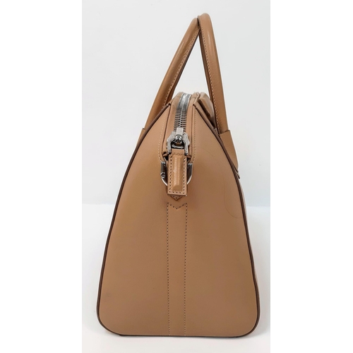 205 - A Givenchy Antigona Leather Shoulder Bag. Brown leather textured exterior. Cream textile interior wi... 