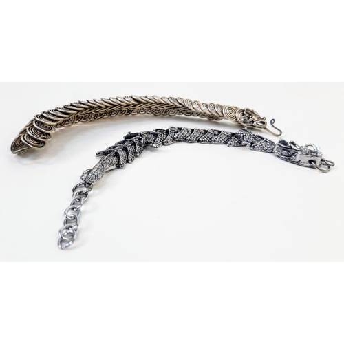 231 - Two Chinese dragon bracelets, white metal (untested), Length: 18cm and 18-21 cm respectively.