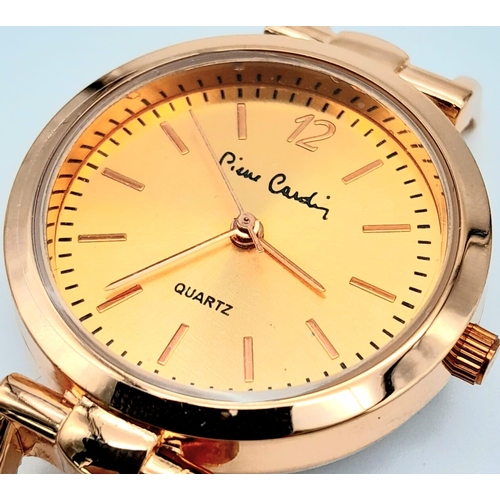 1455 - An Unworn Ladies Gold Tone Quartz Watch by Pierre Cardin. 34mm Including Crown. Comes in box with pa... 