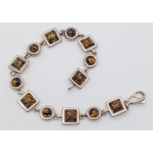 1336 - A Vintage Sterling Silver Green Amber Tennis Bracelet. 18cm Length. Set with Round and Square Cut Gr... 