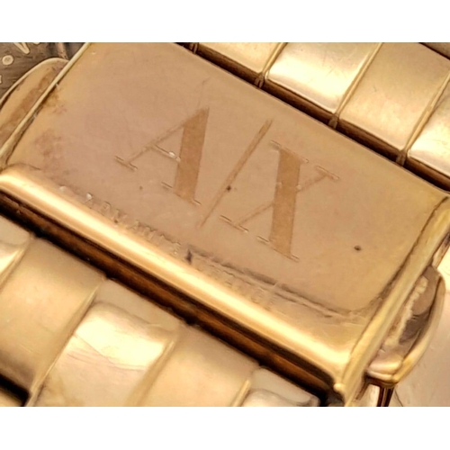 1464 - An Armani Exchange Gold Tone Stone Set Bezel Watch. 40mm Case. New Battery Fitted December 2023.