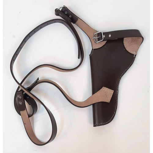 1216 - An Unworn Leather Shoulder Holster. 25cm Open Ended Holster. Will fit many types of Revolver or Pist... 