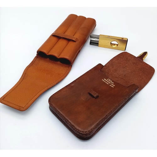 1436 - A Vintage Gentleman’s Leather Cigar Case, Leather Cigarette Case and Gold Tone Cigar Cutter.