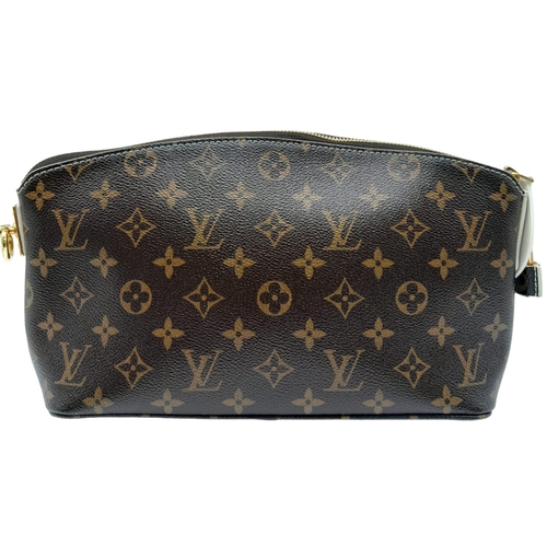 782 - A Louis Vuitton Lockit Fetish Clutch Bag. Monogram canvas with gold tone hardware. Lock and keys. Be... 