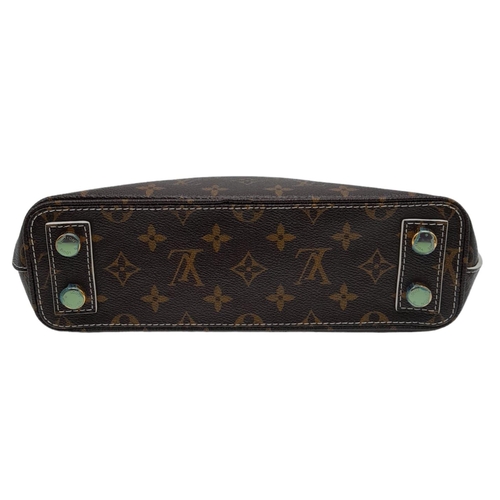 782 - A Louis Vuitton Lockit Fetish Clutch Bag. Monogram canvas with gold tone hardware. Lock and keys. Be... 