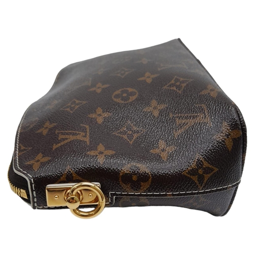 782 - A Louis Vuitton Lockit Fetish Clutch Bag. Monogram canvas with gold tone hardware. Lock and keys. Be... 