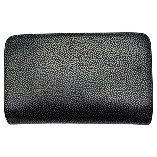 740 - A Chanel Metallic Grey Leather Purse/Wallet. Textured leather exterior with embossed CC logo. Spacio... 