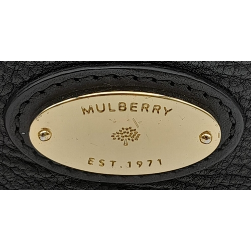 894 - A Black Leather Mulberry Shoulder Bag. Textured exterior with silver-tone hardware. Black textile in... 