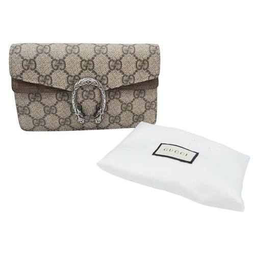 587 - A Gucci Dionysus Chain Wallet. Beige monogram canvas with antique silver tone clasp. Long shoulder c... 