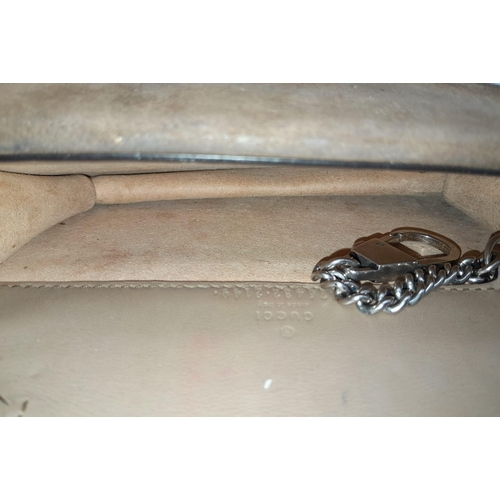 587 - A Gucci Dionysus Chain Wallet. Beige monogram canvas with antique silver tone clasp. Long shoulder c... 