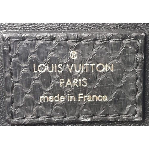 117 - A Louis Vuitton Monogram Black Snakeskin Tote Bag. Gold tone hardware. Spacious black leather interi... 