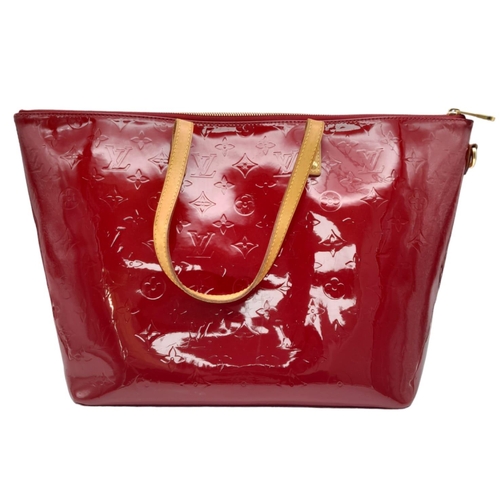 747 - A Louis Vuitton Pomme D'Amour Monogram Vernis Bellevue PM Bag. Red patent leather exterior. Red text... 