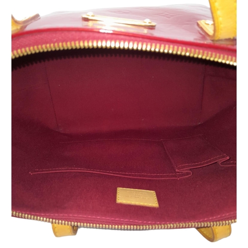 747 - A Louis Vuitton Pomme D'Amour Monogram Vernis Bellevue PM Bag. Red patent leather exterior. Red text... 