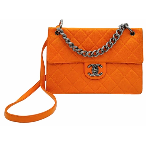 89 - A Chanel Quilted Orange Caviar Leather Shoulder Bag. Quilted pattern exterior with gunmetal hardware... 