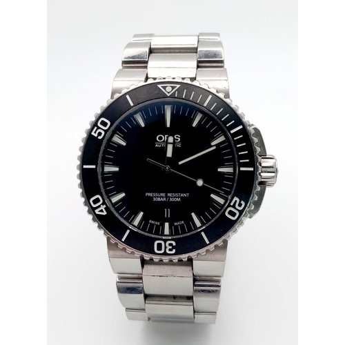 362 - An Oris Automatic Gents Divers Watch. Stainless steel bracelet and case - 41mm. Black dial. Pressure... 