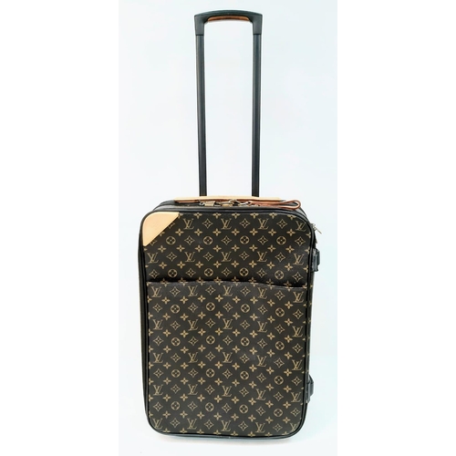 797 - A Louis Vuitton Monogram Canvas Pegase Rolling Suitcase.
37 x 55 x 20cm. Leather accents. Large outs... 