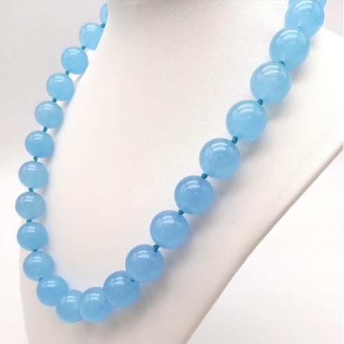 842 - A Large Blue Jade Beaded Necklace. Ice blue 14mm beads. 42cm length.