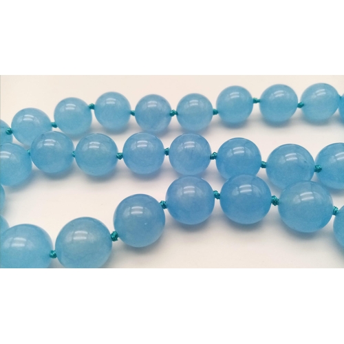 842 - A Large Blue Jade Beaded Necklace. Ice blue 14mm beads. 42cm length.